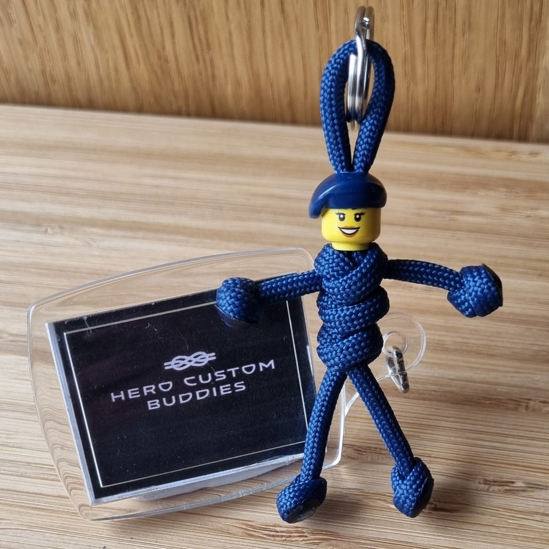 Female royal navy keychains made with paracord and building blocks